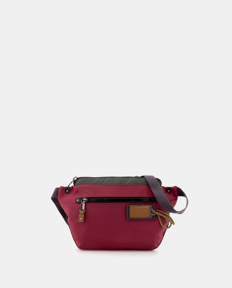 Scharlau - Riñonera de mujer en color fucsia con cierre de cremallera.