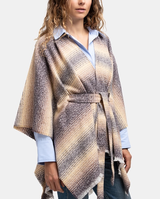 Imagen 0 de Poncho negro con lazada en beige