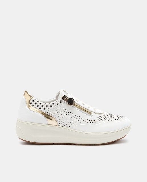 Imagen 0 de Zapatillas de mujer en piel blanca con detalles troquelados