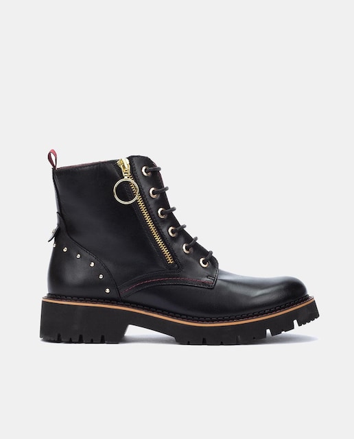 Imagen 0 de Botines de mujer de piel estilo biker con cordones y adorno cremallera