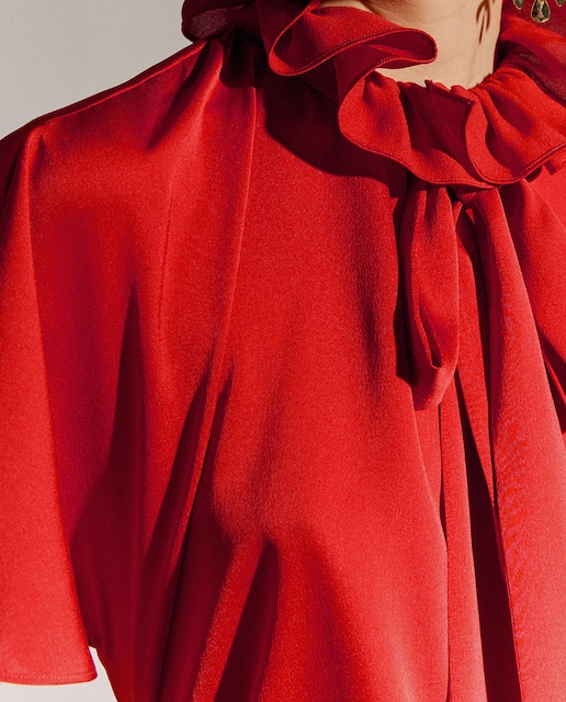 Imagen 0 de Blusa manga corta con volante y cuello lágrima