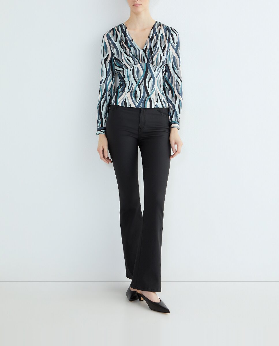 Imagen 0 de Top fluido estampado de mujer