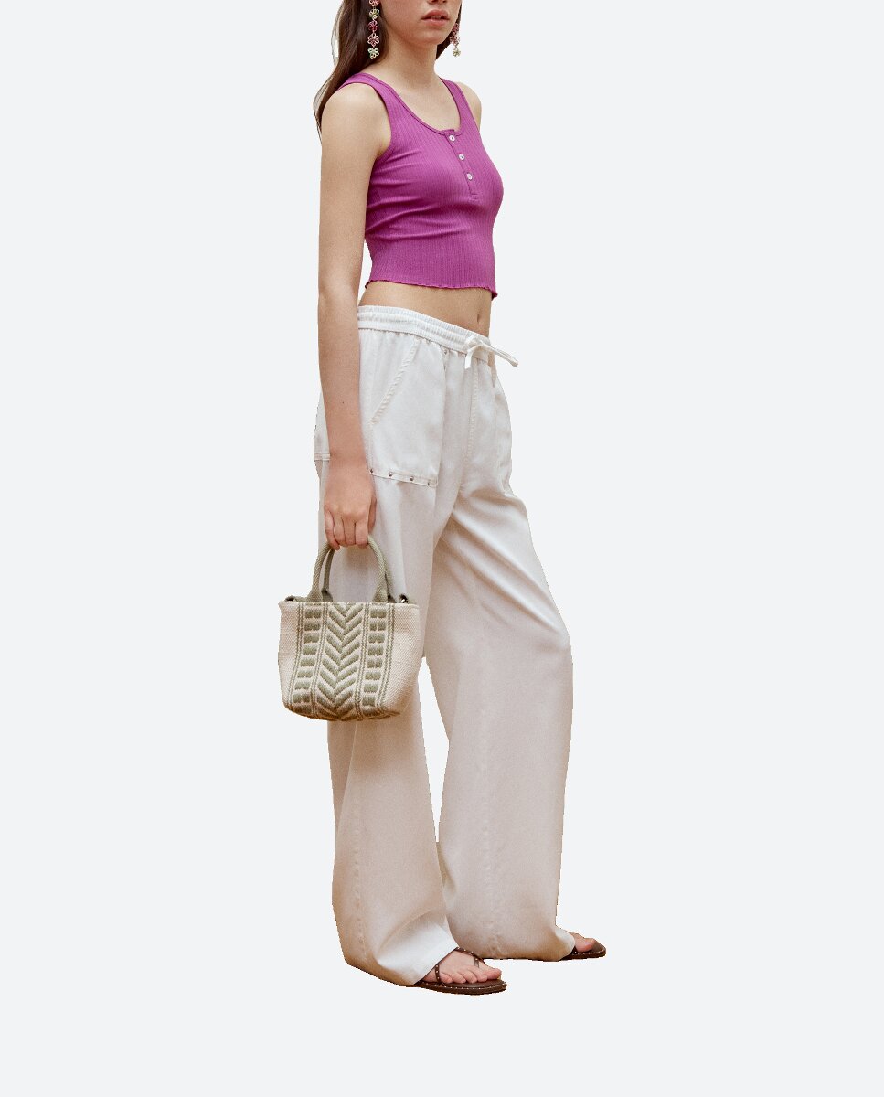 Imagen 0 de Pantalón tachas fluido de mujer