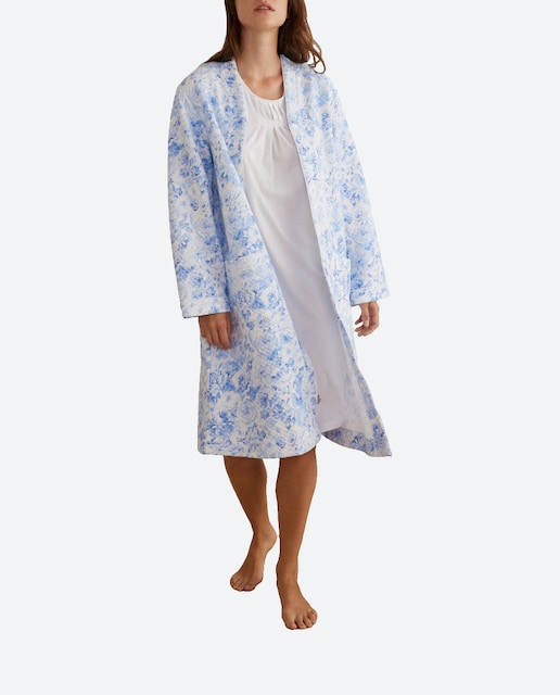 Imagen 0 de Bata corta manga larga con cremallera y bolsillos laterales estado floral