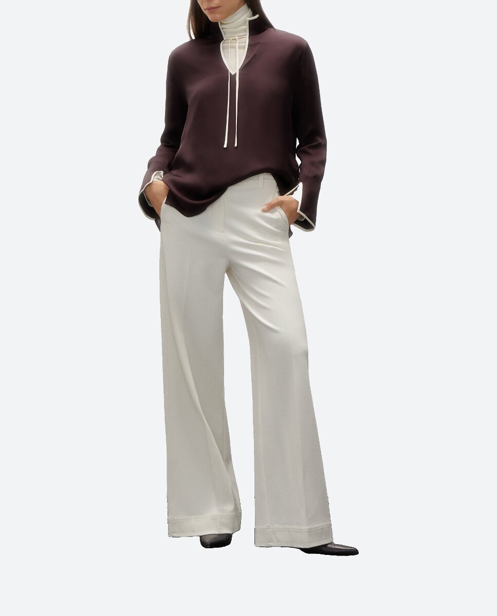 Imagen 0 de Blusa con lazo vivos a contraste