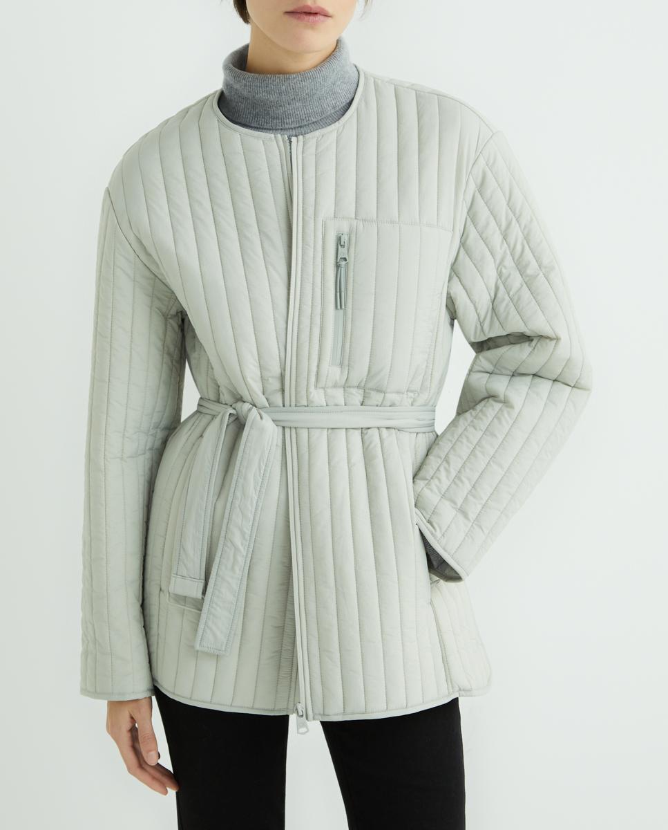 Imagen 0 de Chaqueta de mujer en color beige con cinturón