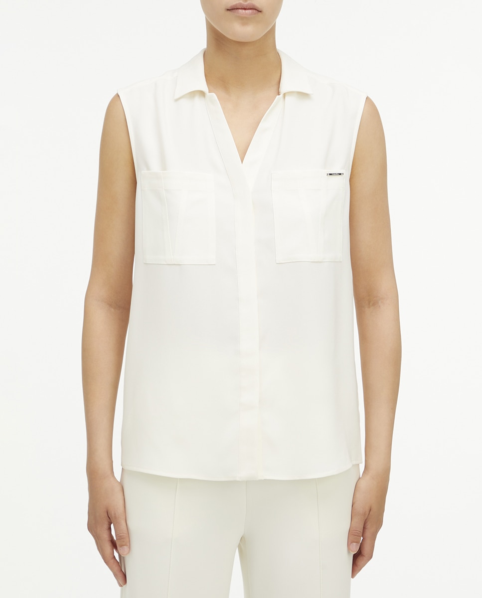 Imagen 0 de Blusa con bolsillo sin mangas