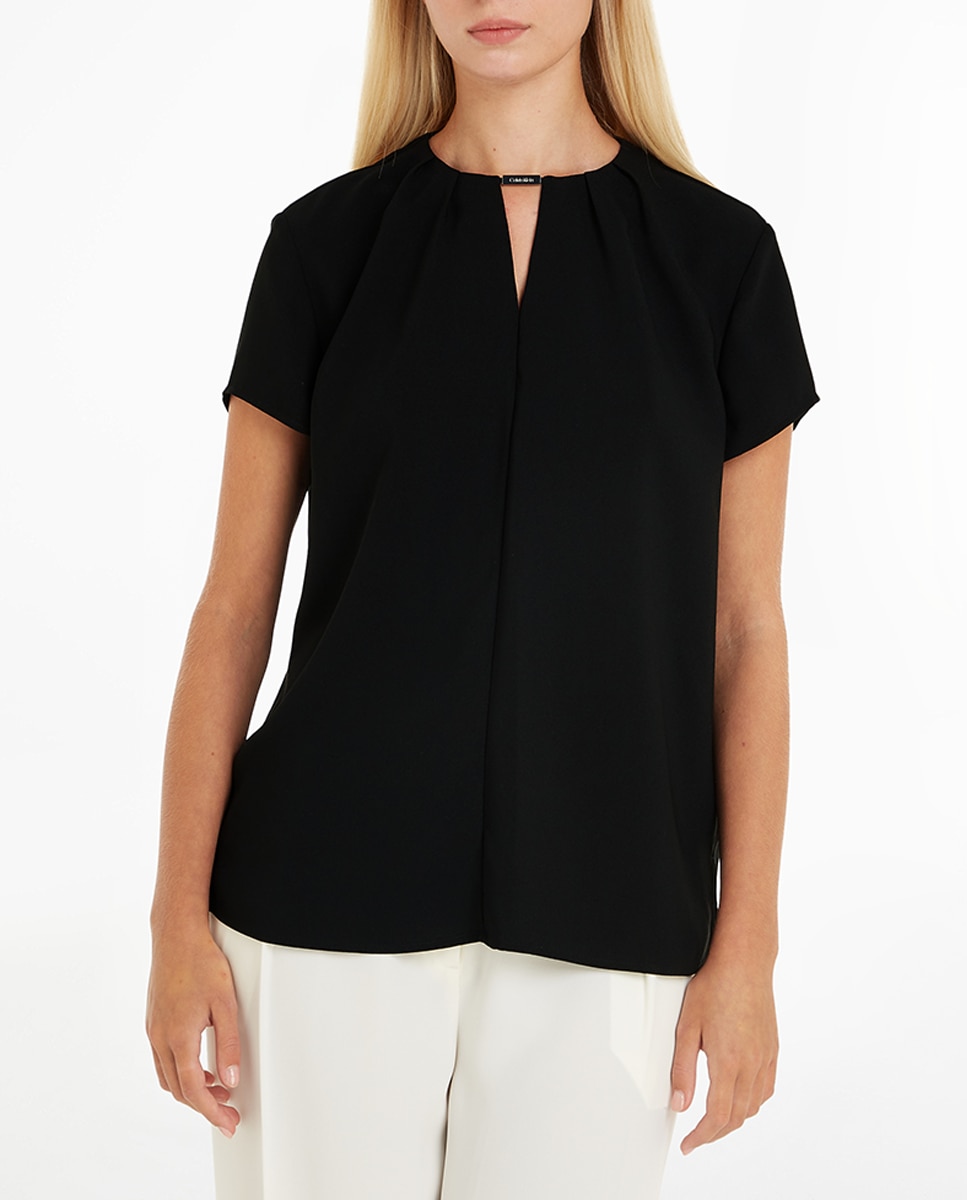Imagen 0 de Blusa con bolsillo sin mangas