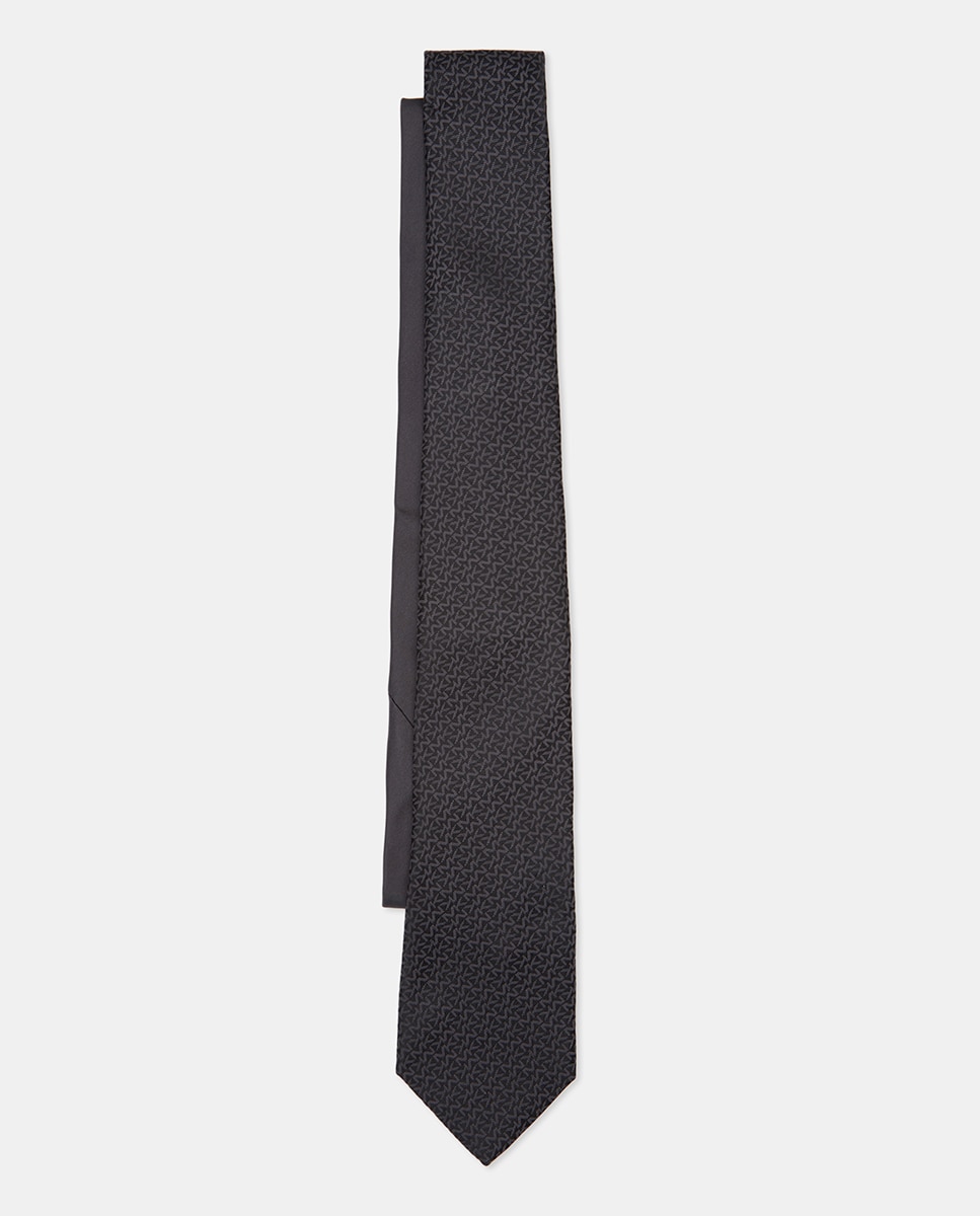 Imagen 0 de Corbata de seda con iniciales de la marca en color gris.