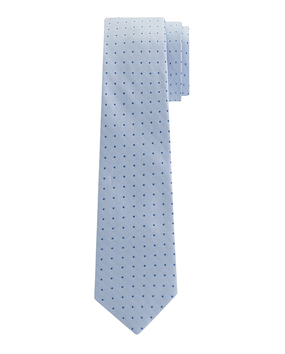 Imagen 0 de Corbata de seda en color azul claro, presenta un estampado geométrico.