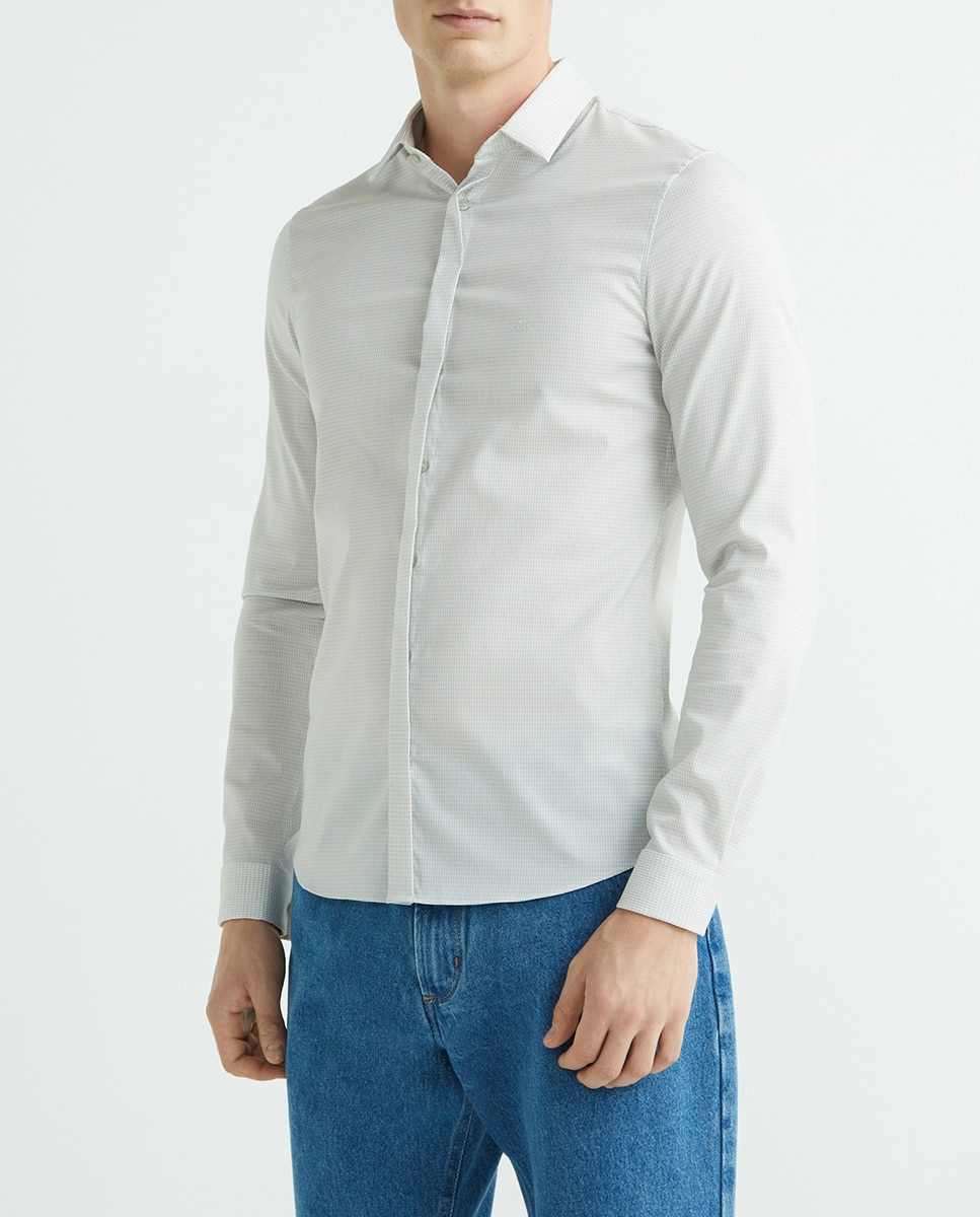 Imagen 0 de Camisa de hombre de vestir slim de color blanco estampada