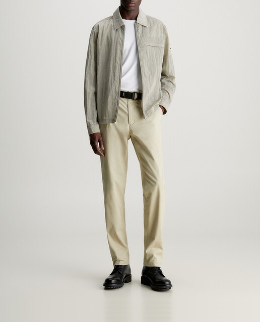 Imagen 0 de Chinos slim con cinturón de hombre