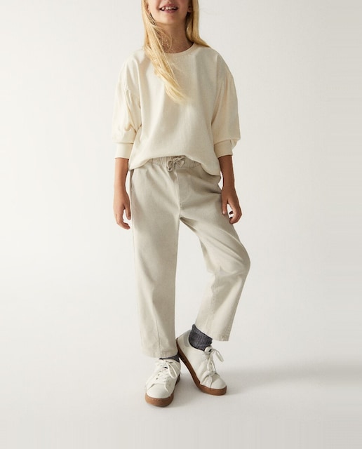 Imagen 0 de Pantalones niña con bolsillos y cintura elástica