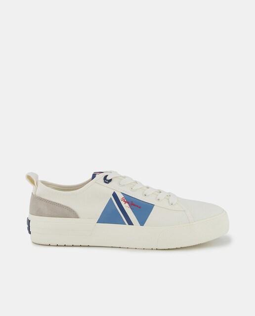 Imagen 0 de Zapatillas de hombre en blanco bajas tipo casco de lona con logotipo lateral y detalles multicolor