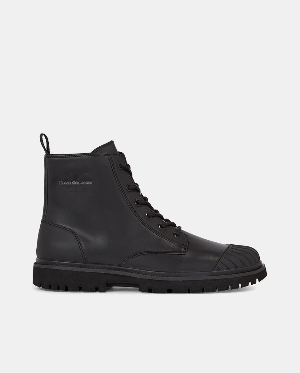 Imagen 0 de Botas de hombre en piel con cordones y puntera de goma