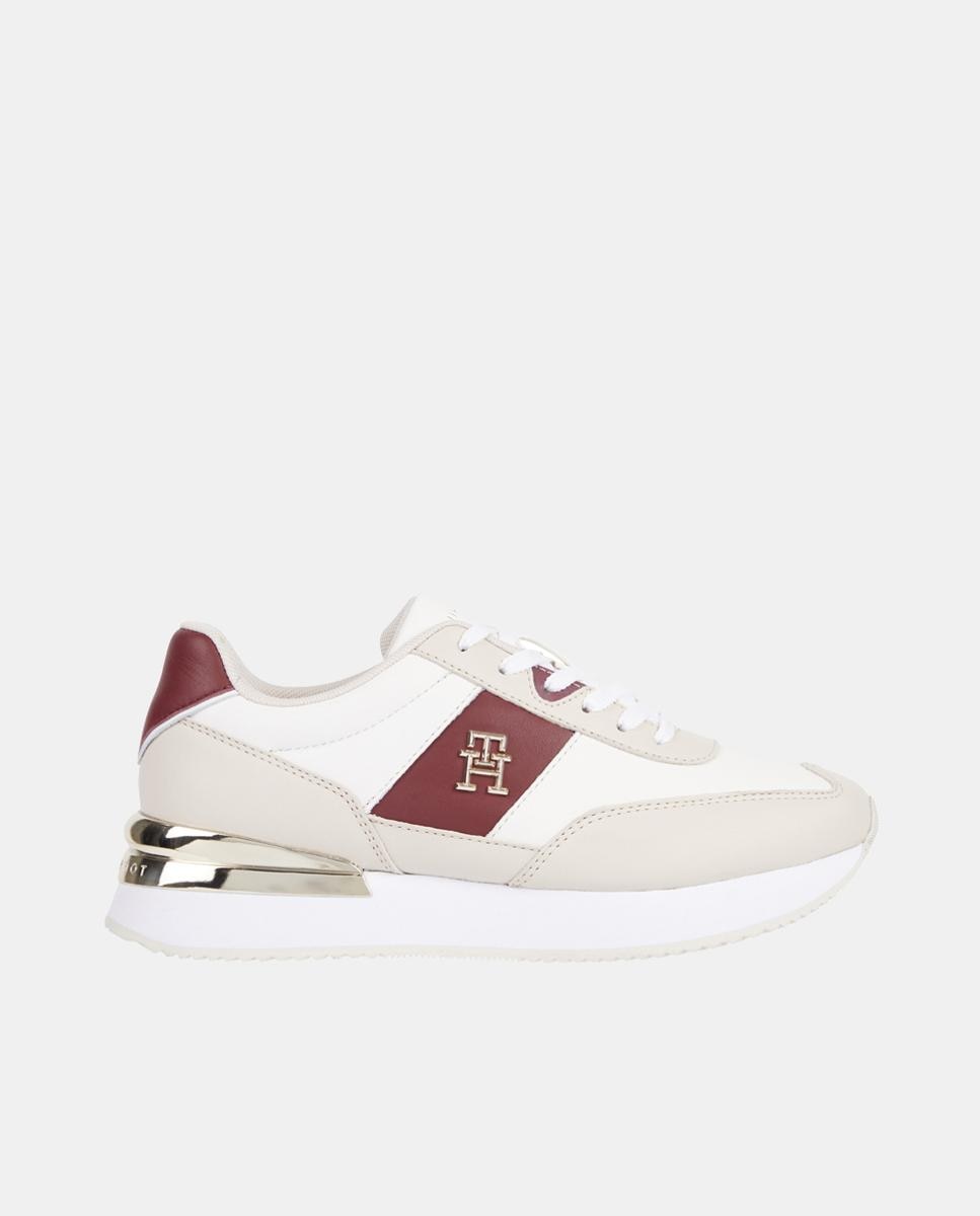 Imagen 0 de Zapatillas de mujer tipo running bajas en piel con logotipo lateral metálico