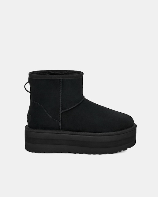 Imagen 0 de Botas Classic Mini de mujer en piel con plataforma