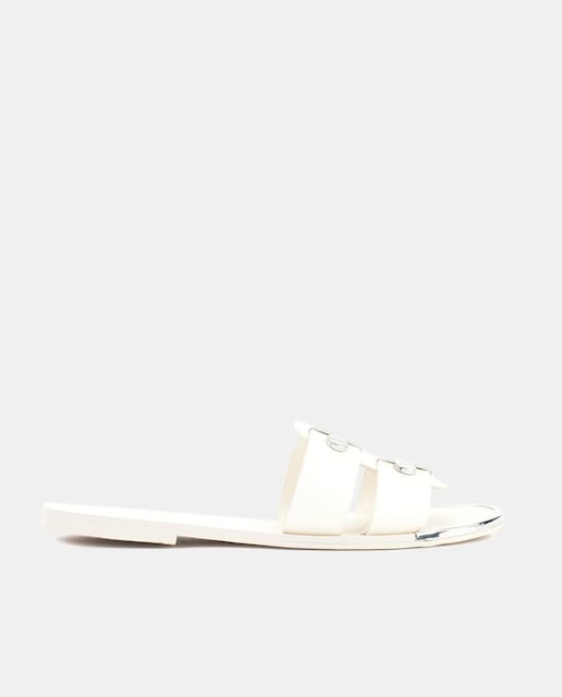 Imagen 0 de Sandalias planas Glynn de mujer en piel con tiras anchas y tachas