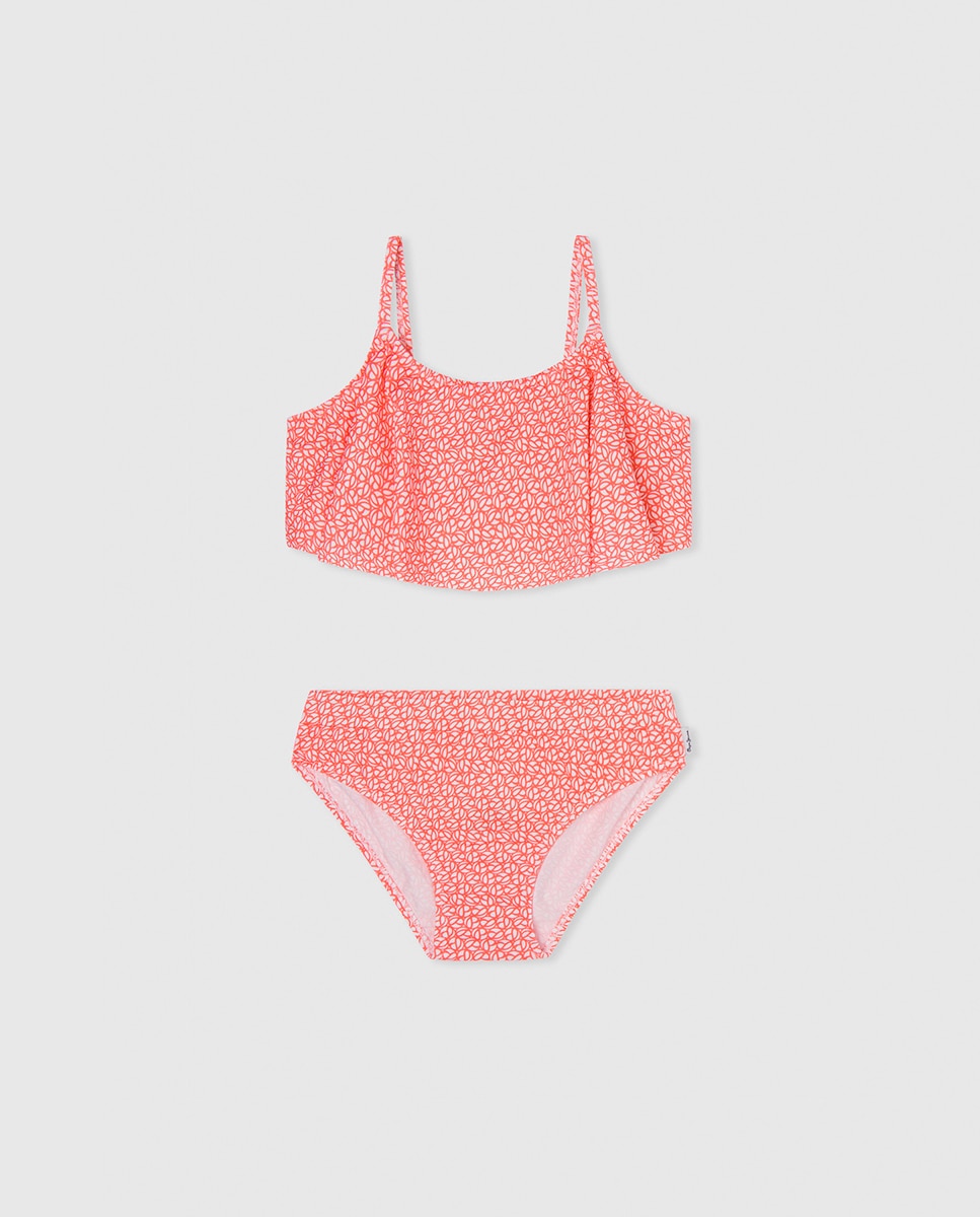 Imagen 0 de Bikini de niña con volante y estampado multilogo y coletero a juego