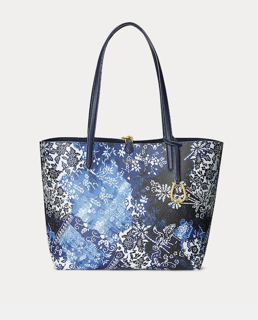 Imagen 0 de Tote mediano reversible en azul marino con print floral