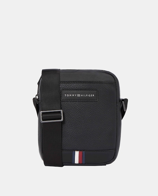 Imagen 0 de Bandolera estilo mini reporter de hombre en color negro con diseño de rayas de Tommy Hilfiger.