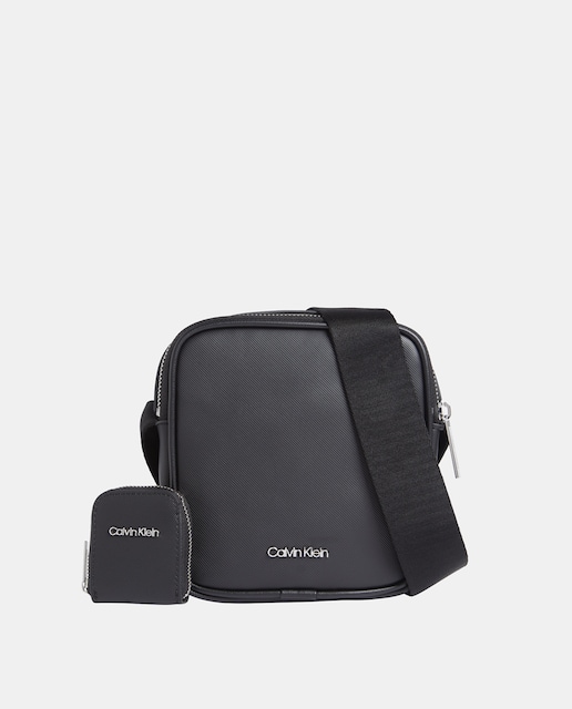 Imagen 0 de Bandolera Calin Klein y estuche para los cascos