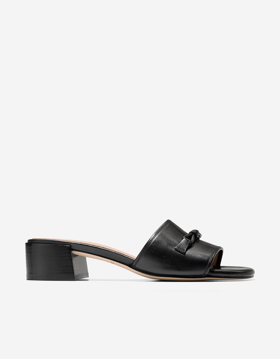 Imagem 0 de Mules de Salto Confecionadas em Pele