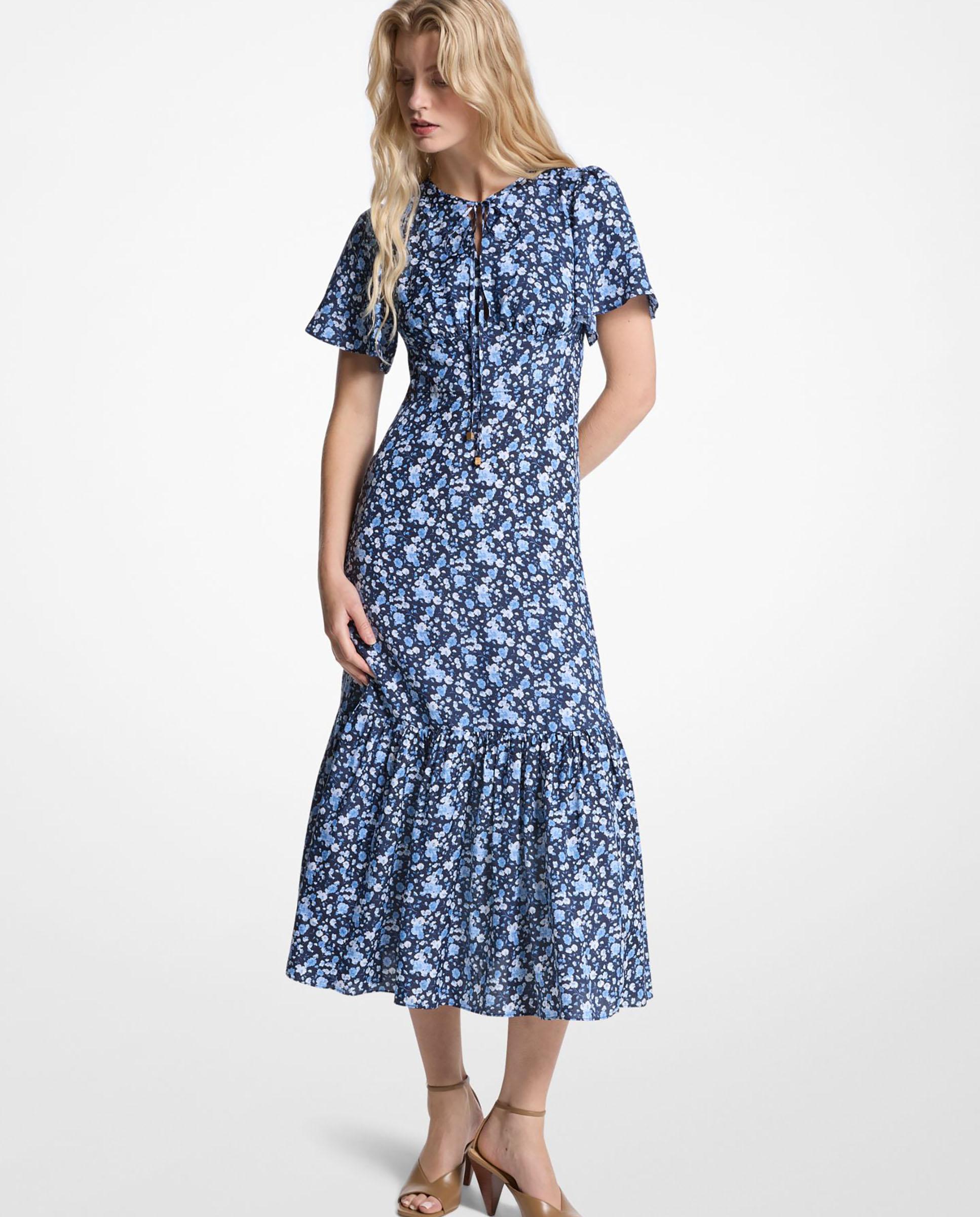 Imagem 0 de Vestido Midi com Estampado Floral e Detalhe de Laçada na Gola