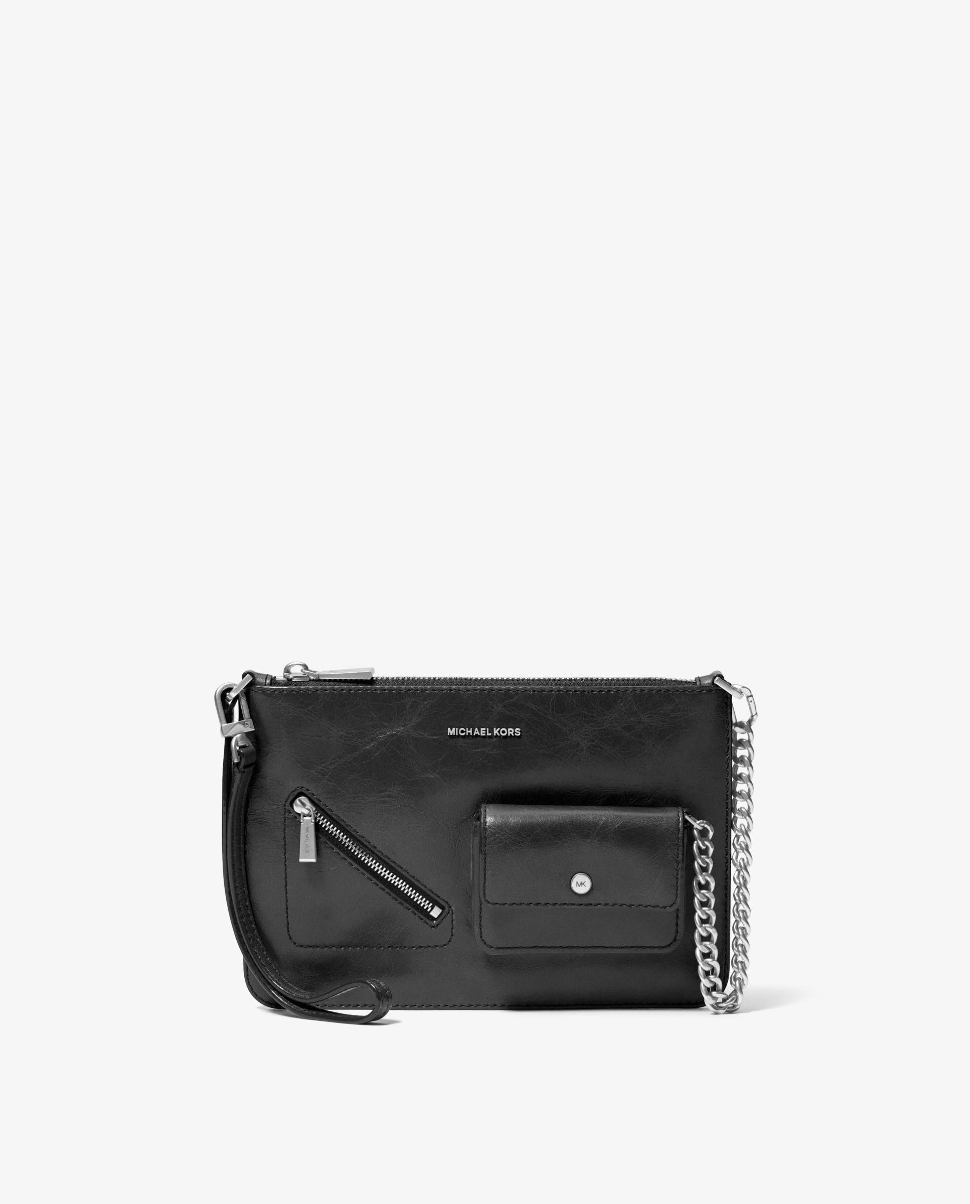 Imagem 0 de Mala de Mão de Pulseira Transformável Jet Set Grande de Pele com Fecho Zip