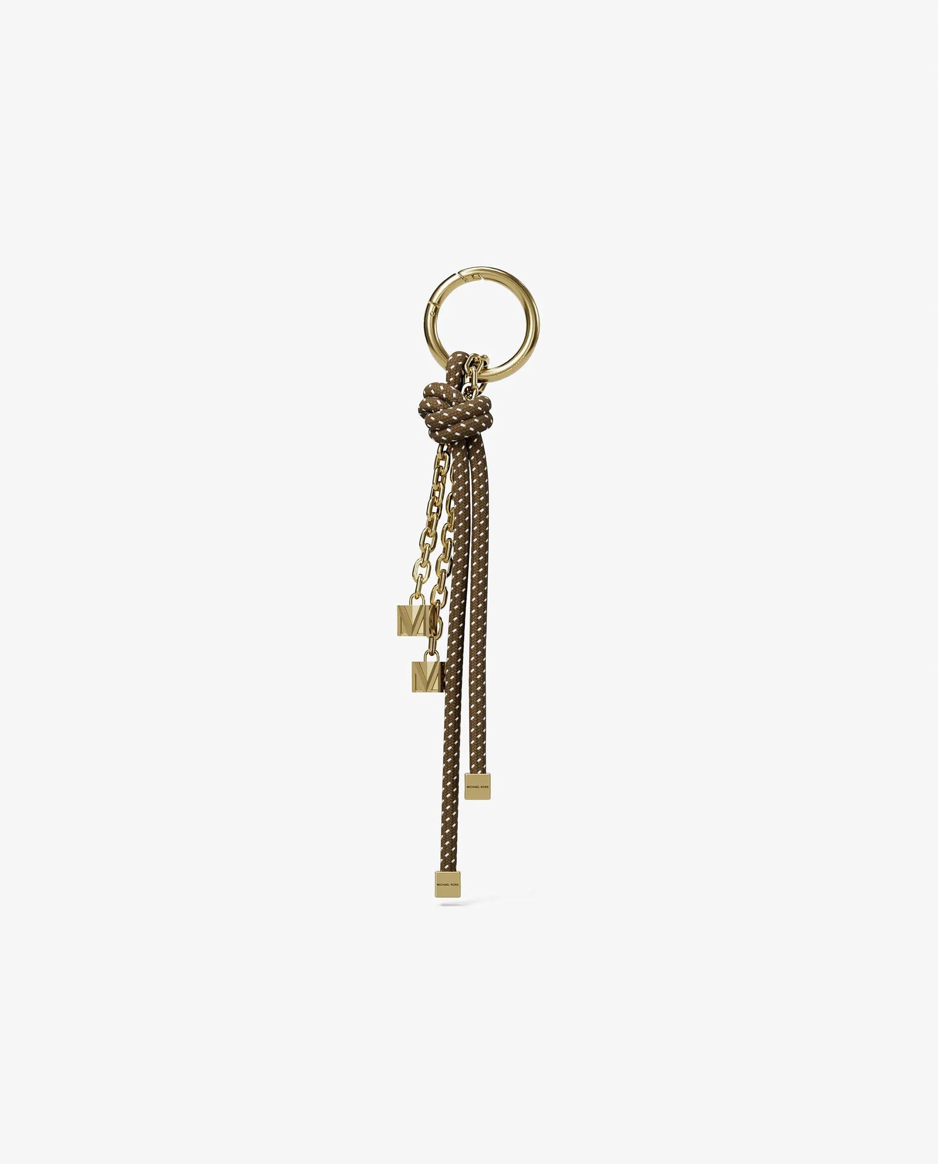 Imagem 0 de Adorno para Mala em Dourado com Cordão Moteado