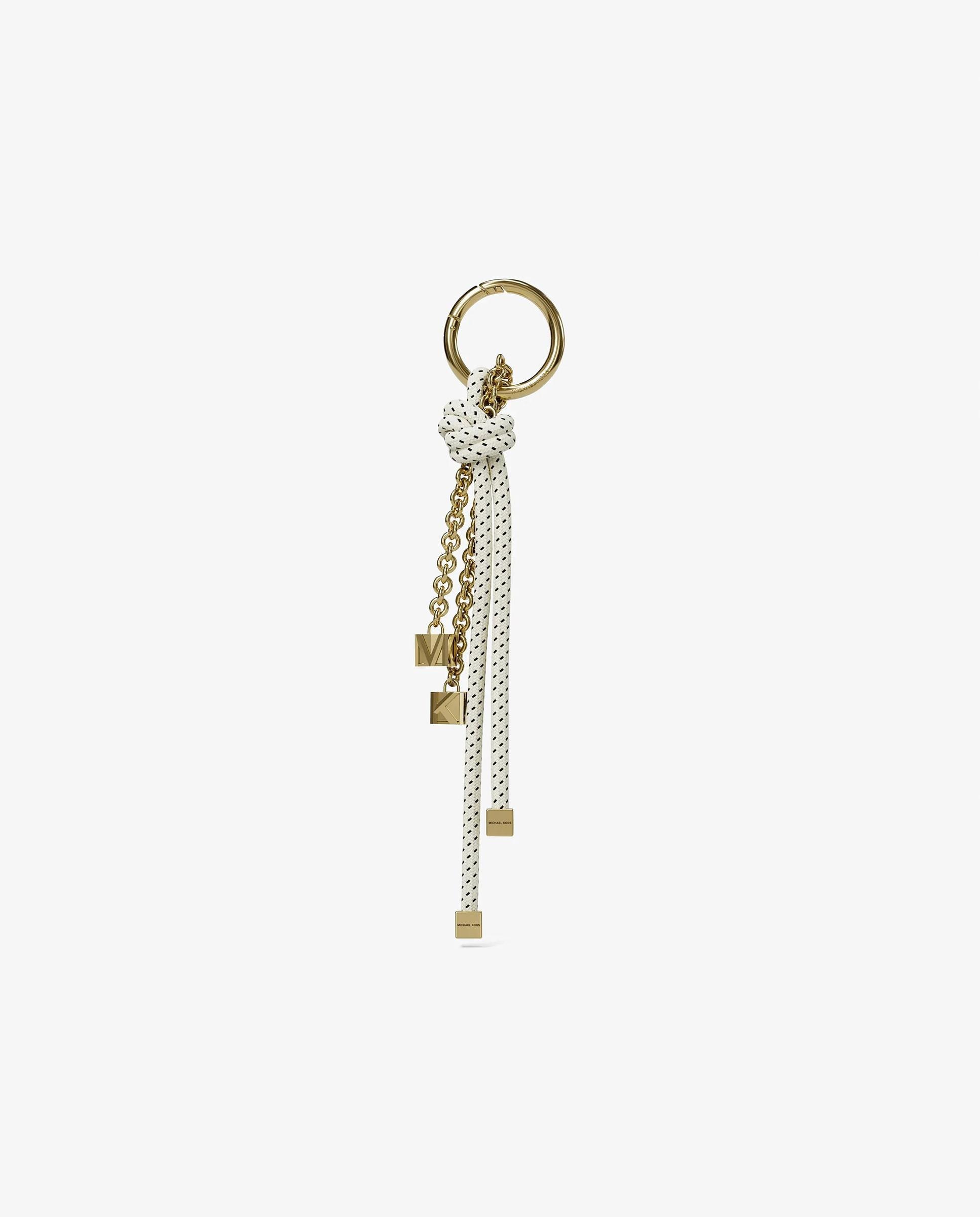 Imagem 0 de Adorno para Mala em Dourado com Cordão Moteado