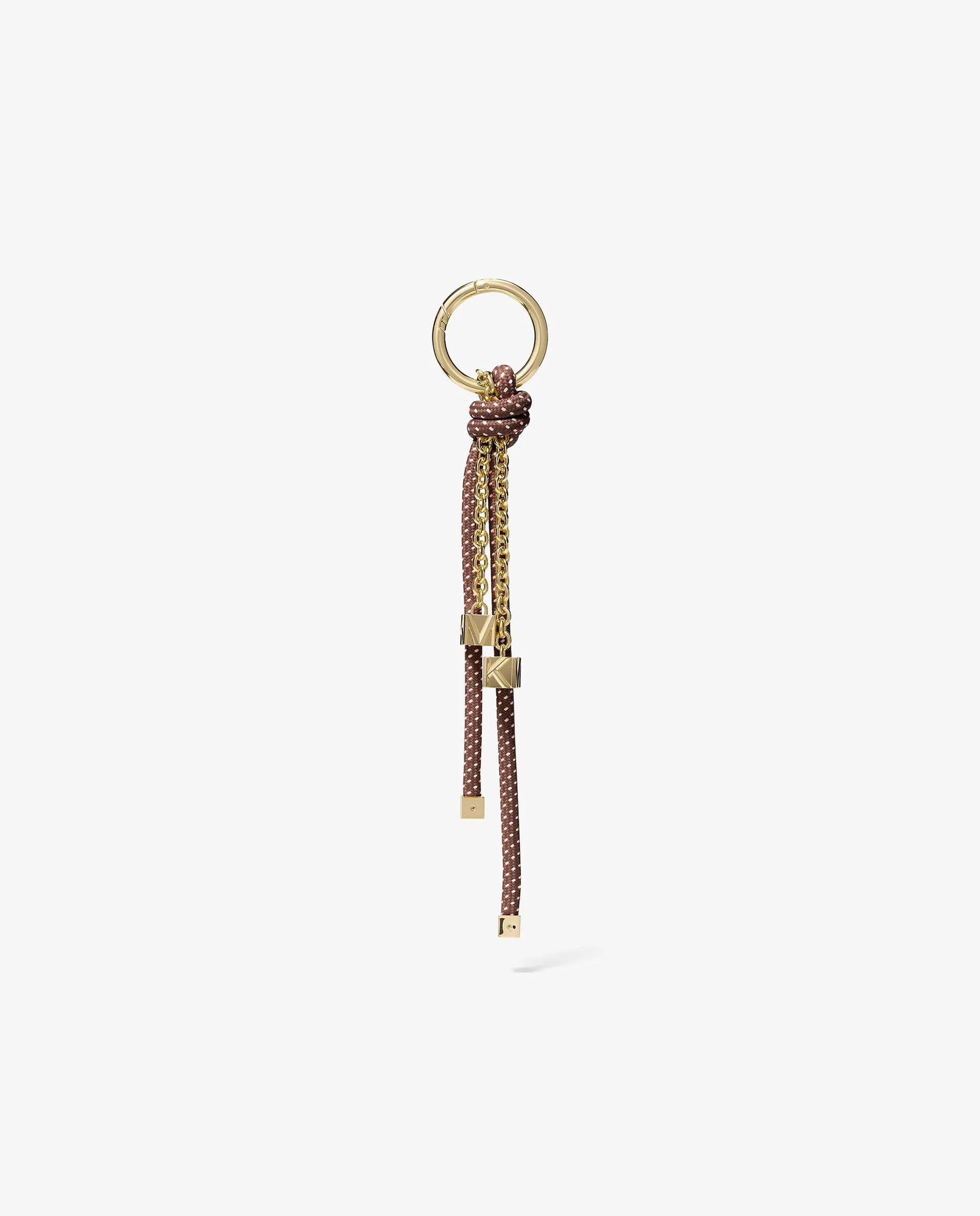Imagem 0 de Adorno para Mala em Dourado com Cordão Moteado