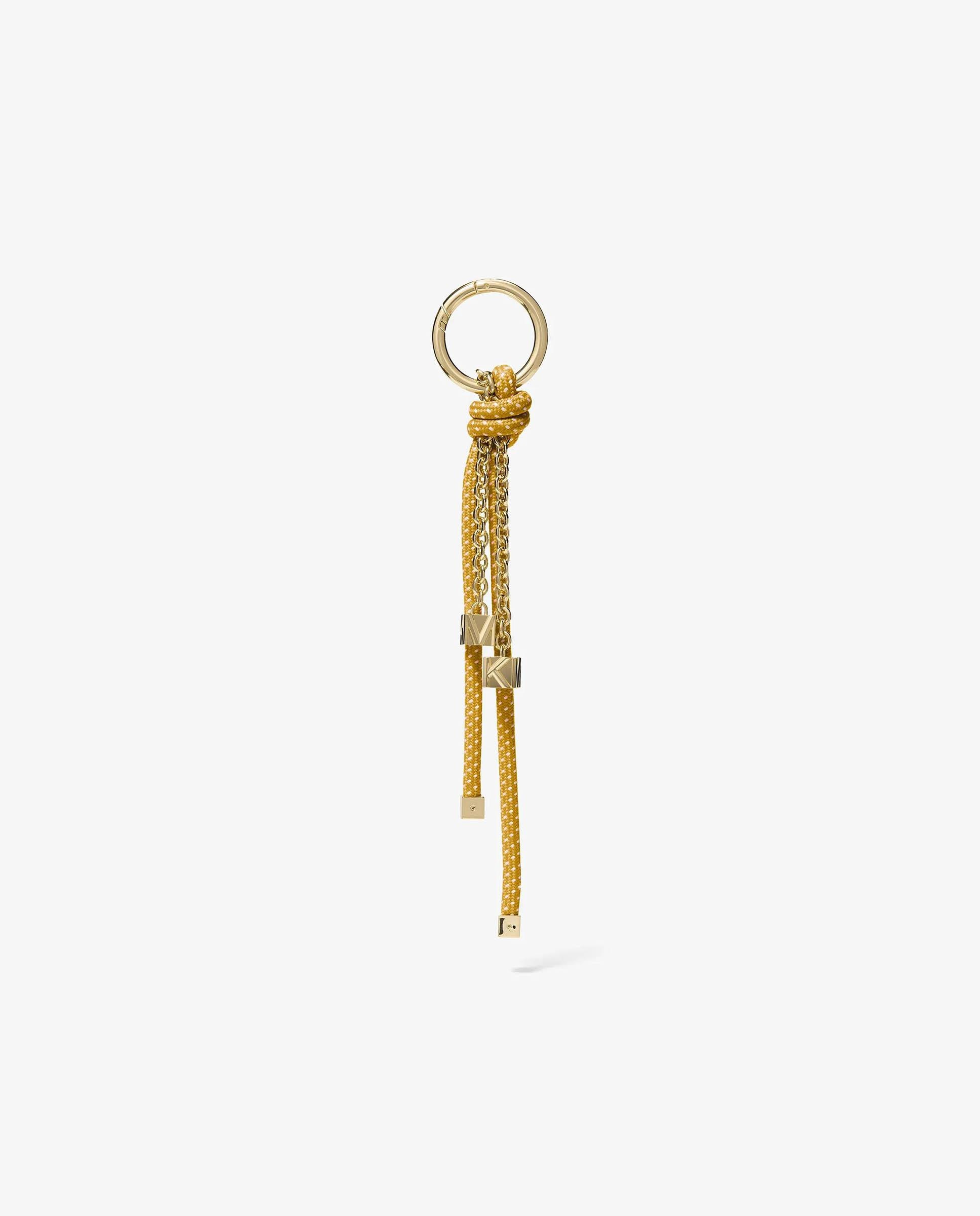 Imagem 0 de Adorno para Mala em Dourado com Cordão Moteado