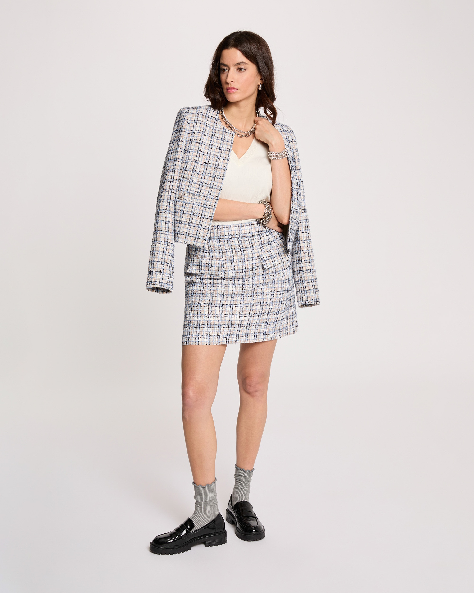 Imagem 0 de Saia Curta em Tweed com Bolsos