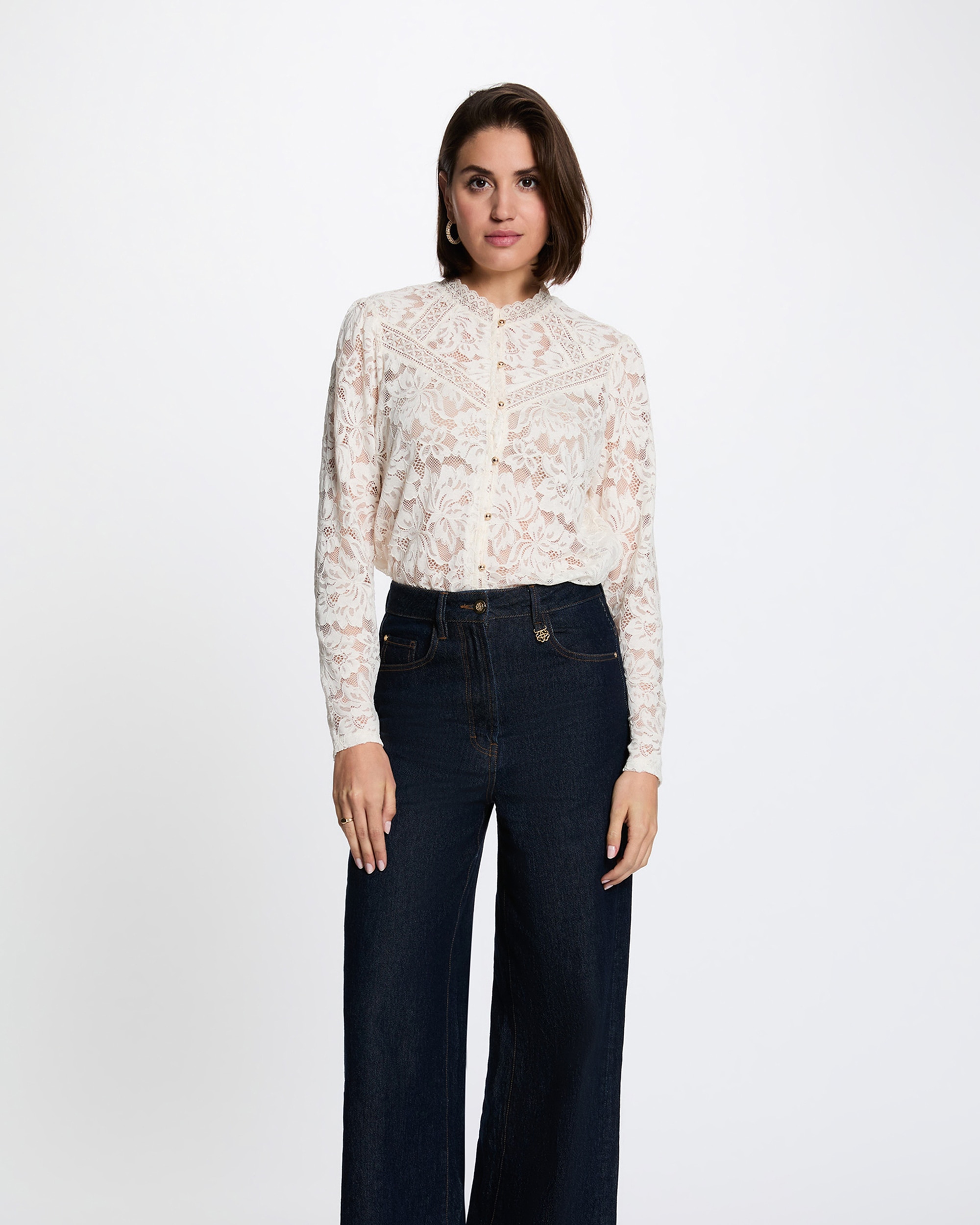Imagem 0 de Blusa de Renda com Gola Alta
