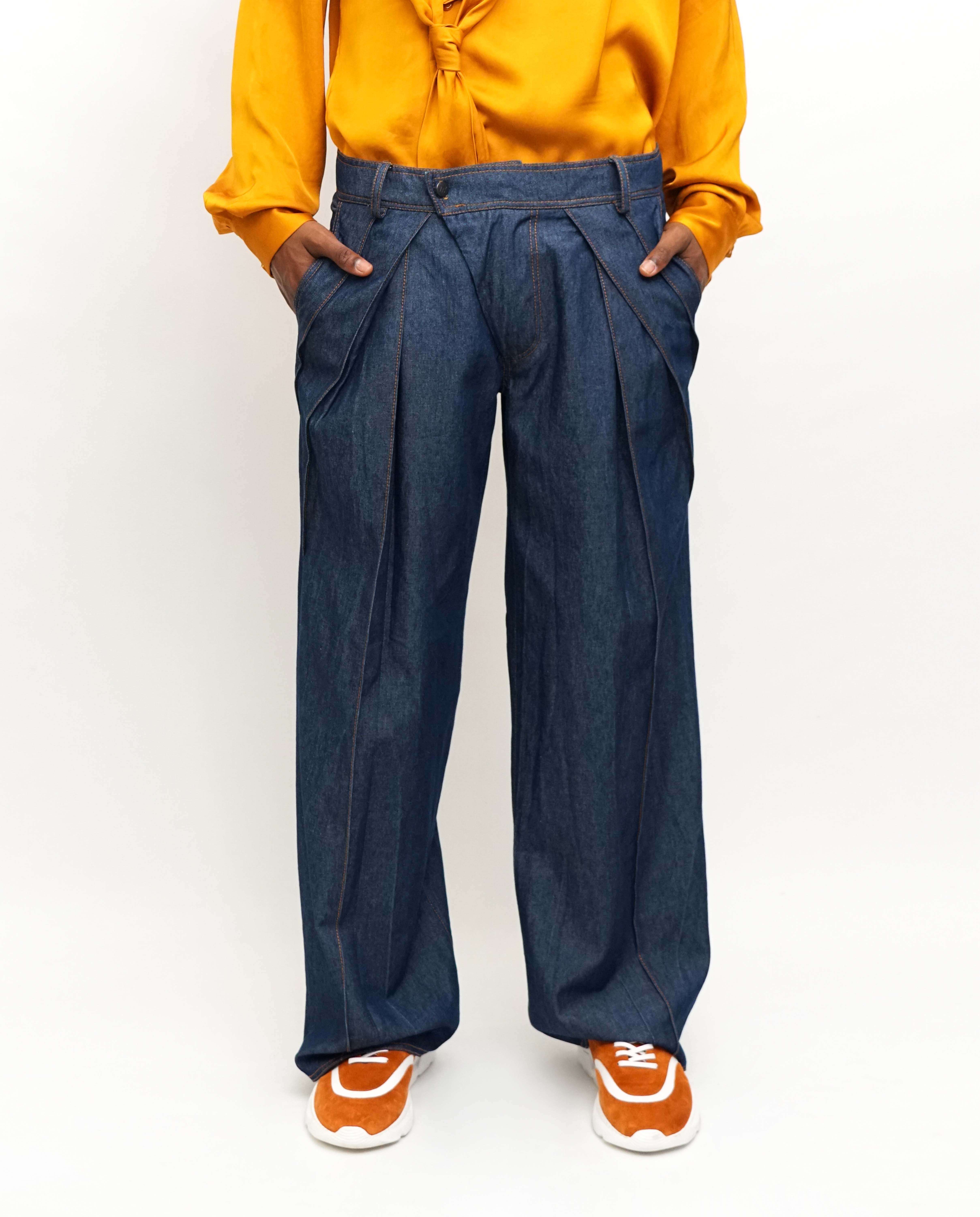 Imagem 0 de Calças ganga assimétricas com pregas sobrepostas e perna larga - Azul