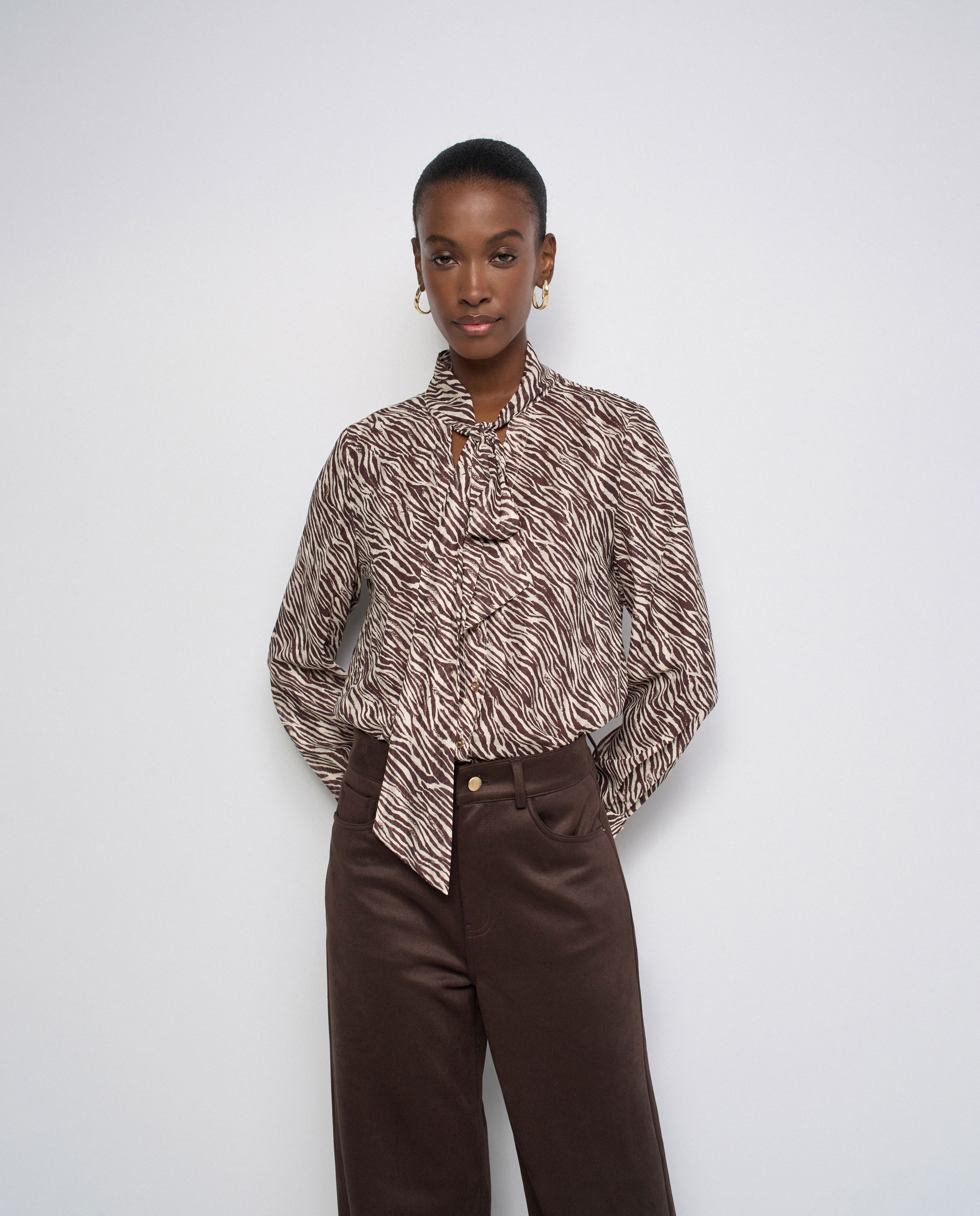 Imagem 0 de Camisa Animal Print com Laço