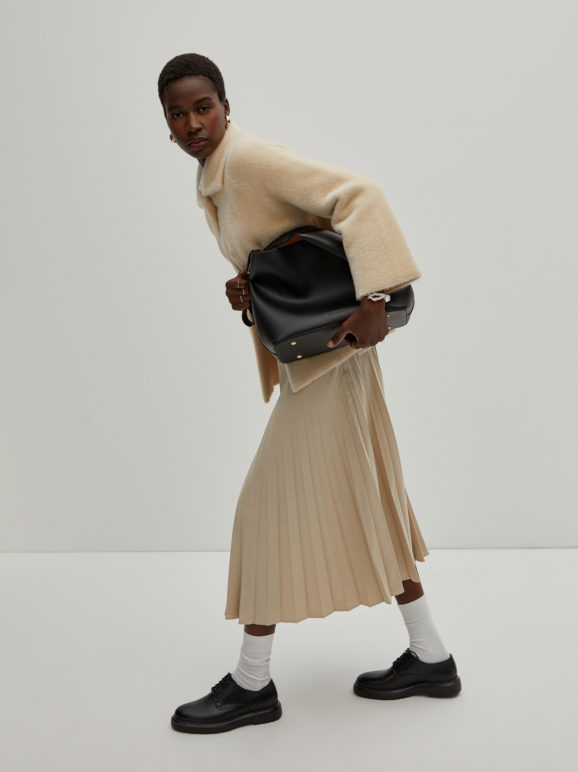 Imagem 0 de Casaco de pelo com mangas raglan