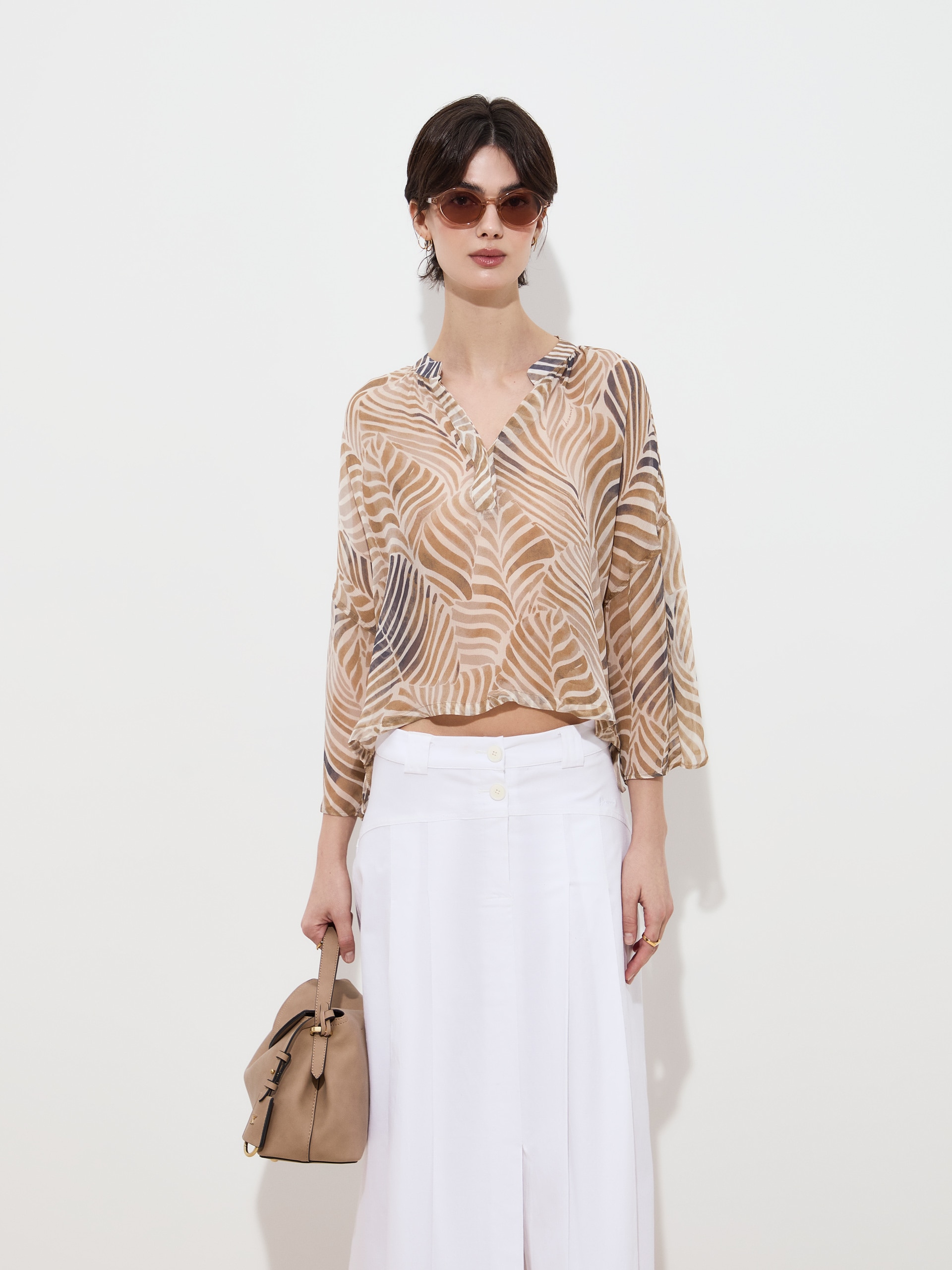 Imagem 0 de Blusa com Estampado de Folhas