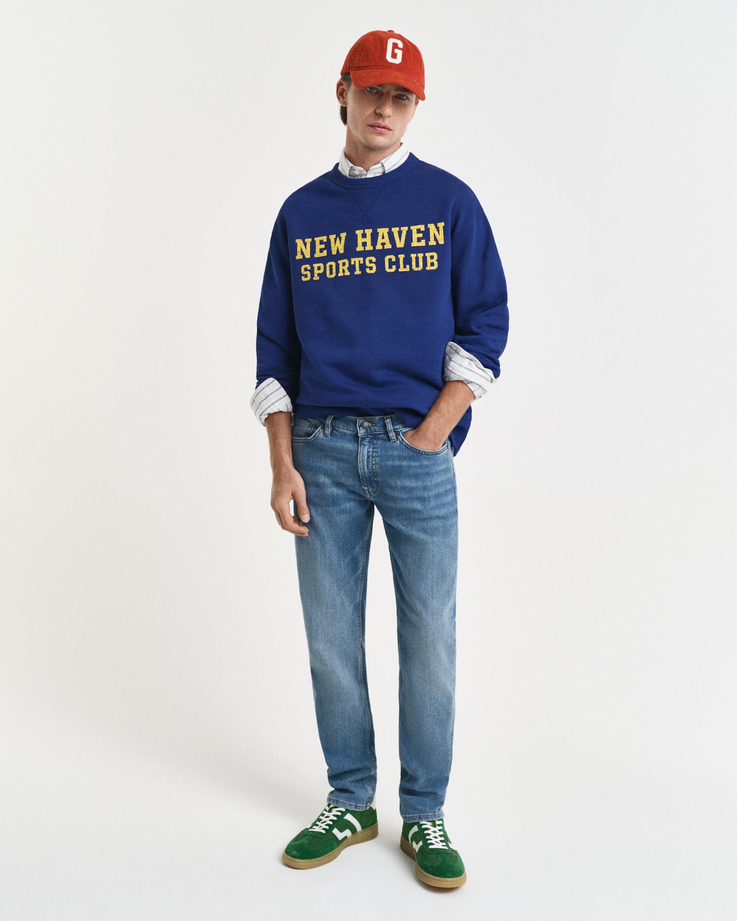 Imagem 0 de Jeans Slim com Detalhe de Patch e Cintura Média