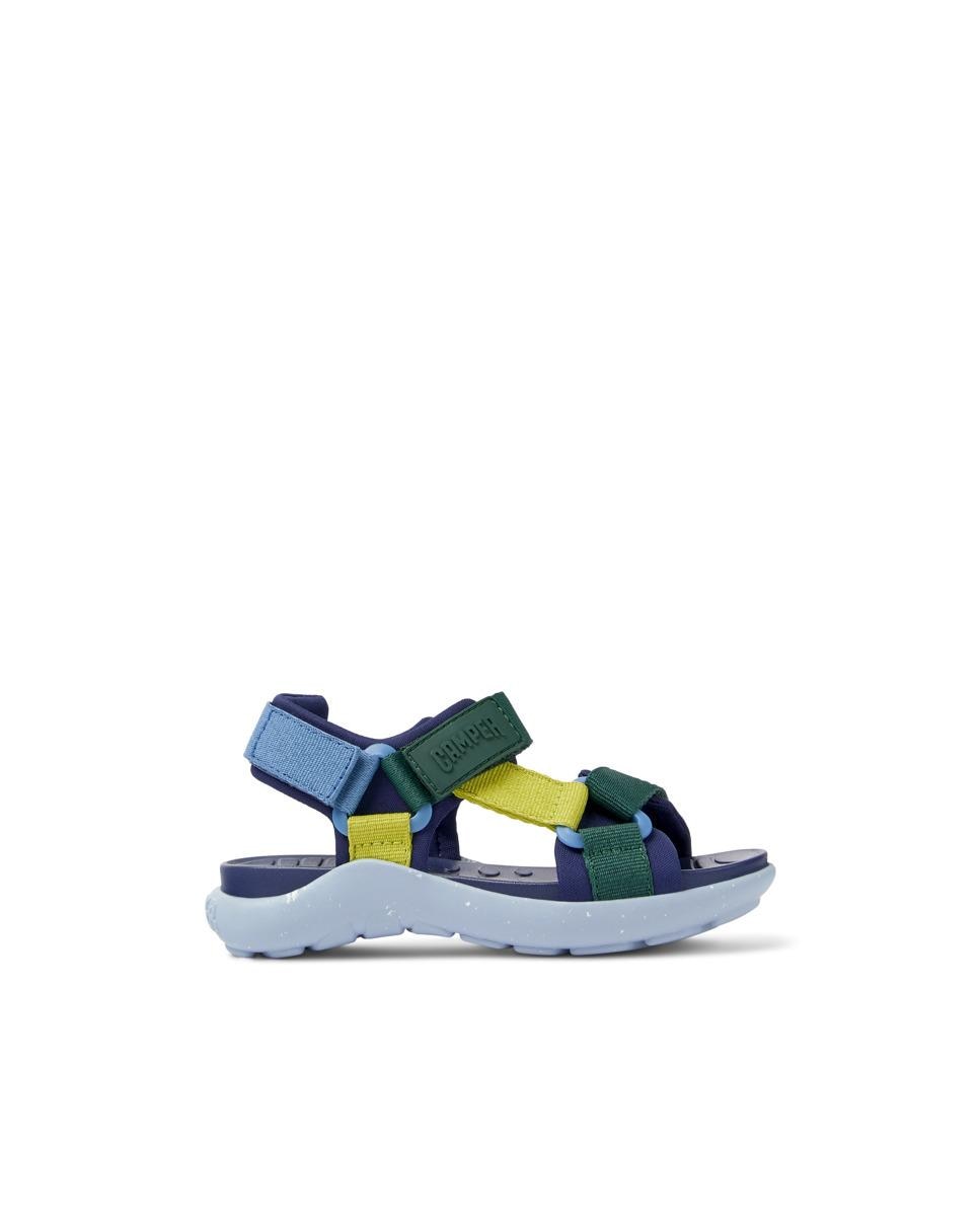 Imagem 0 de Sandálias multicolor de tecido para criança com palmilhas amovíveis OrthoLite® Recycled™ e solas de borracha (20% recicladas). Desenhado para atividades tanto em terra como na água, Wous é fabricado com uma pele protetora e um design único, adequado para qualquer aventura de verão.