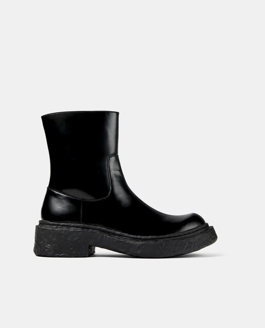 Imagem 0 de Botas Unissexo de Pele de Cano Baixo