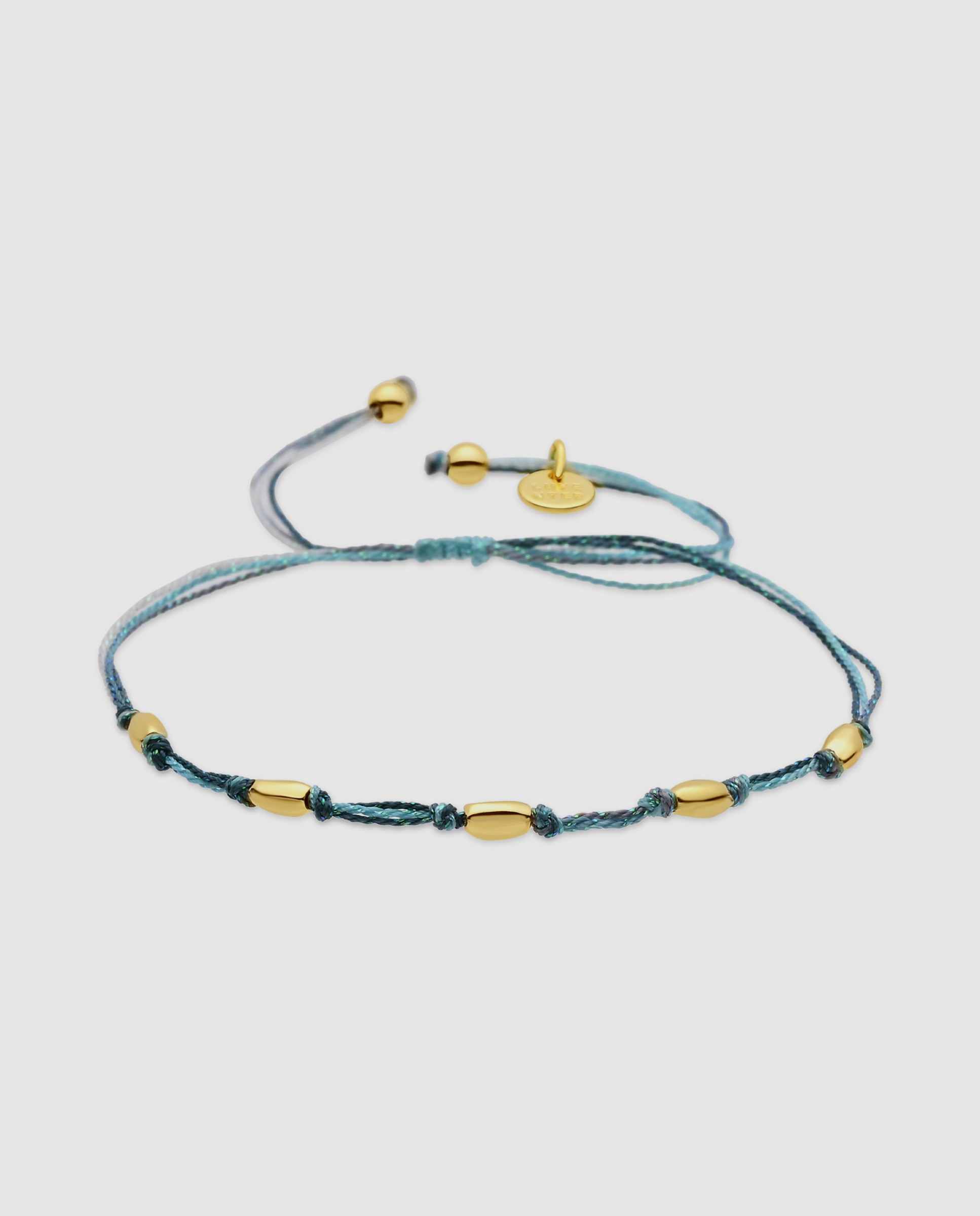 Imagem 0 de Pulseira Tornozeleira África Acabada em Ouro Amarelo 18k com Algodão Cinzento
