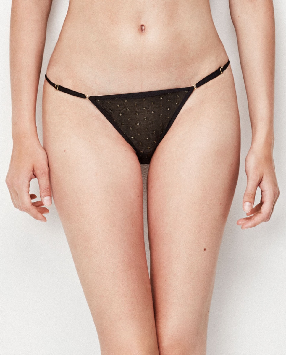 Imagem 0 de Cueca de Tira com Bolinhas Douradas em Contraste