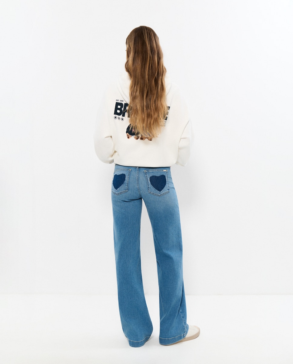 Imagem 0 de Jeans com Corte a Direito e Bolsos