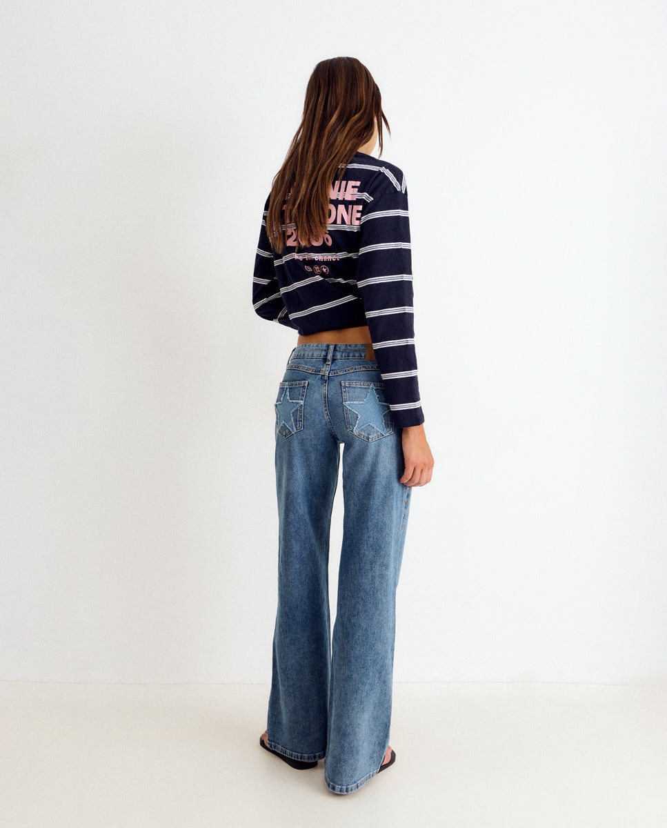 Imagem 0 de Jeans Largos com Estrelas