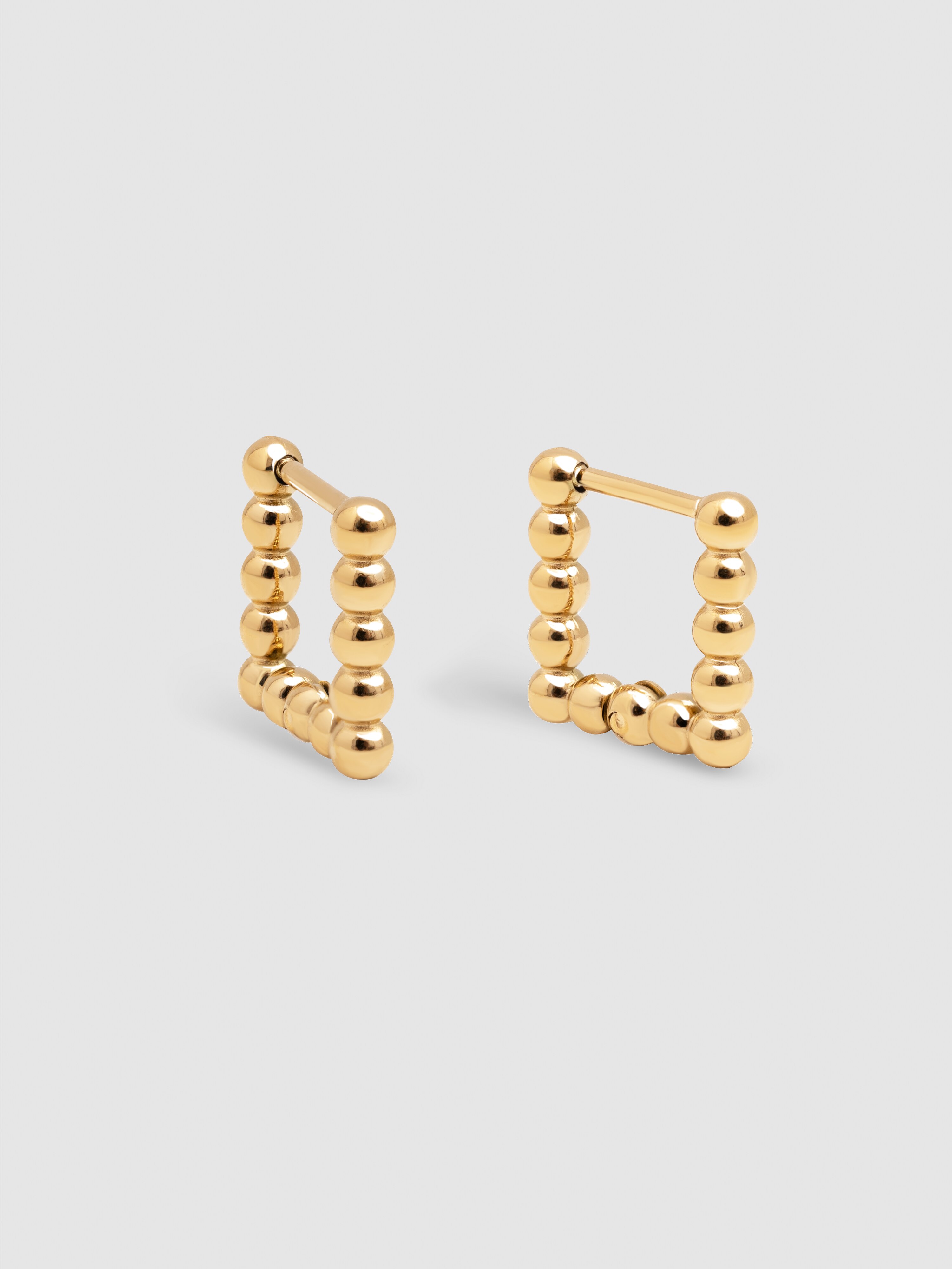 Brincos Mila Dots de Aço Banhados a Ouro Dourado-1