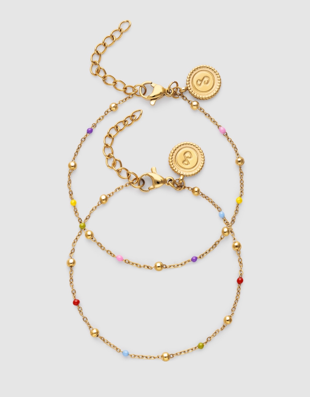 Pack 2 Pulseiras Amizade Coloridas de Aço Banhado em Ouro Rosa-1