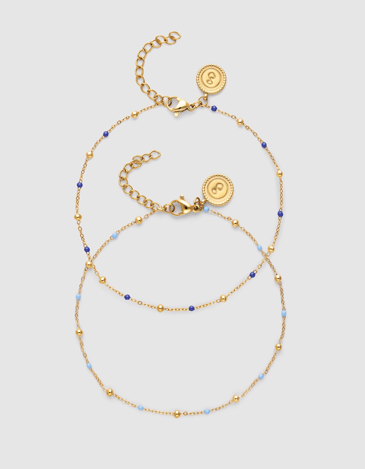 Imagem 0 de Pulseira de Corrente Pack 2 Amizade Azul de Aço Banhado a Ouro
