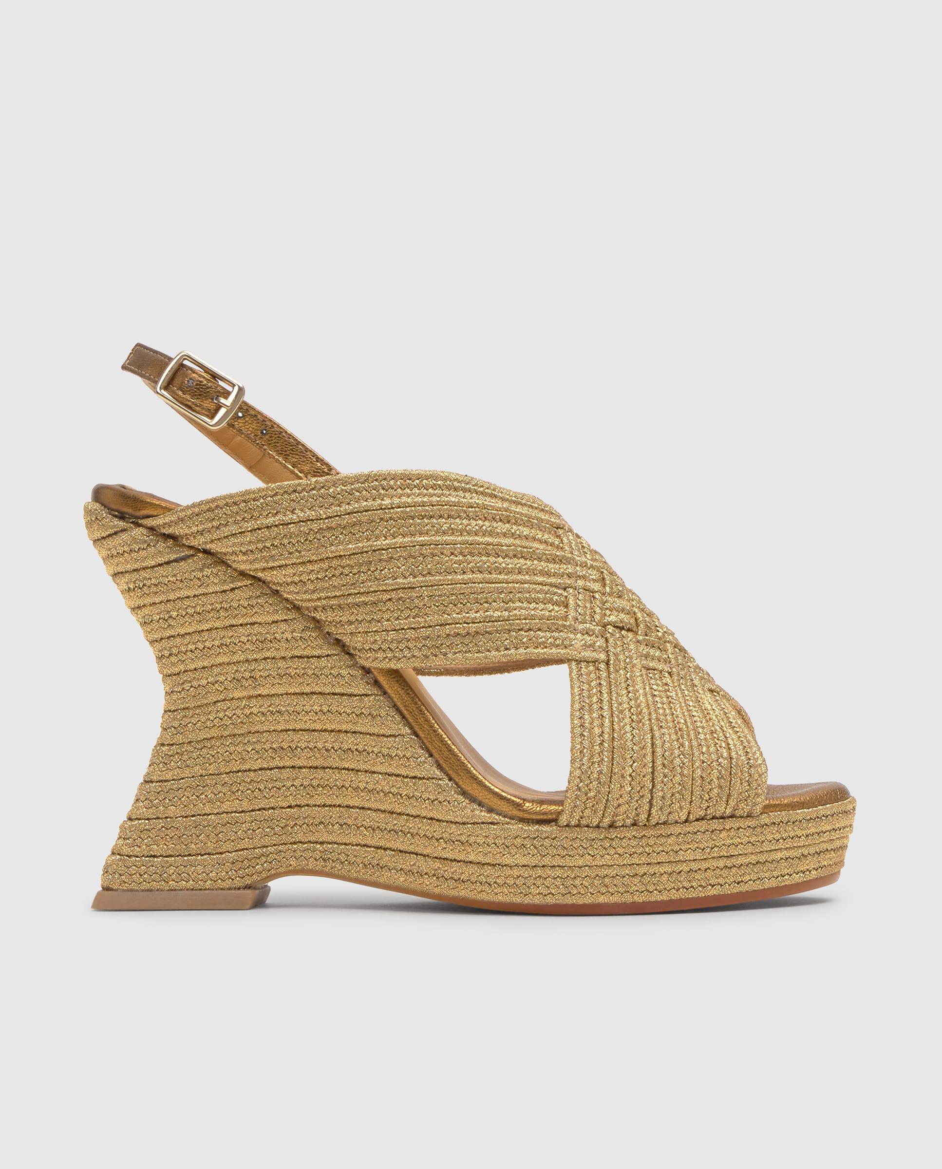 Imagem 0 de Sandálias Juliet com Calcanhar Aberto e Fecho de Fivela e Entrançado Metalizado